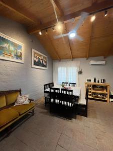 a living room with a couch and a table at Portal del Cachilito in Tres Marías