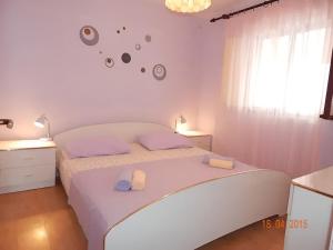 En eller flere senge i et værelse på Seaside house with a swimming pool Prigradica, Korcula - 22904