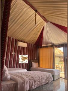Letto o letti in una camera di V D C Wadi Rum