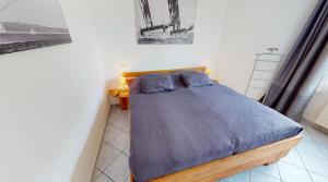 Postel nebo postele na pokoji v ubytování Seewind W02