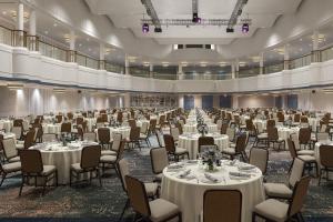 a large banquet hall with tables and chairs at Hotel Cleveland Autograph Collection in Cleveland