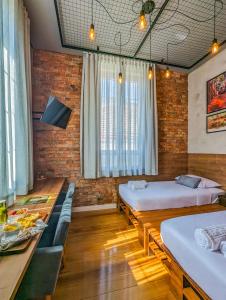 Voodi või voodid majutusasutuse Hotel Boutique Ayni toas