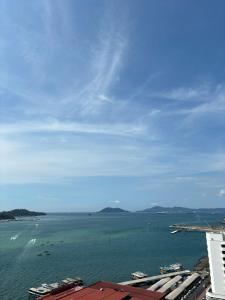 a view of a large body of water at The Shore by MD Staycation in Kota Kinabalu