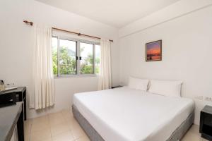 Letto o letti in una camera di PP Charlie Beach Resort