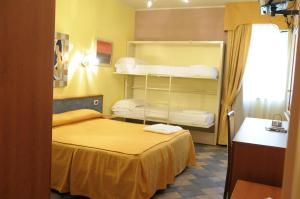 Postel nebo postele na pokoji v ubytování Hotel Blumentag