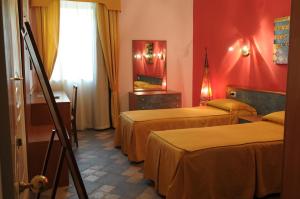 Postel nebo postele na pokoji v ubytování Hotel Blumentag
