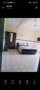 1 dormitorio con 1 cama en el centro de una habitación en Liba rooms panamaram en Panamaram