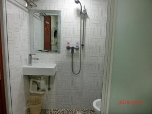 Kopalnica v nastanitvi Li Cheng Guesthouse