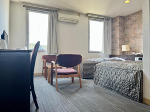 Nakamura Daiichi Hotel客房内的一张或多张床位
