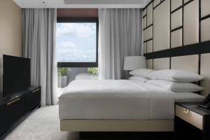 Katil atau katil-katil dalam bilik di Lagos Marriott Hotel Ikeja