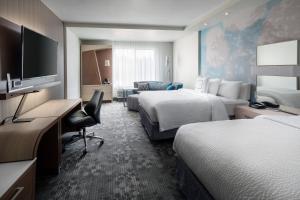 Katil atau katil-katil dalam bilik di Courtyard by Marriott Pullman