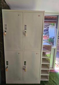 a group of lockers in a room at Nahm Khao Sok Hostel and Camping in Khao Sok National Park