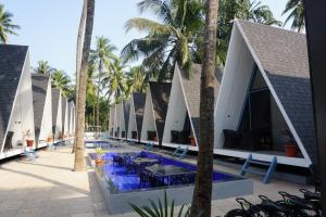 a view of the pool at the resort at NAMASTE BEACH RESORT in Jāmb