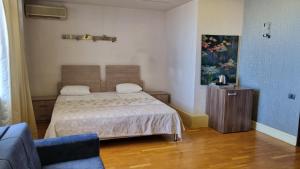 Postel nebo postele na pokoji v ubytování Baku Sea View Hotel