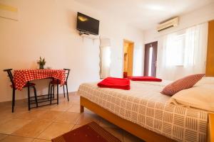 Katil atau katil-katil dalam bilik di Old Town Accommodation