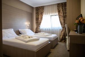 Hotel Narenta客房内的一张或多张床位