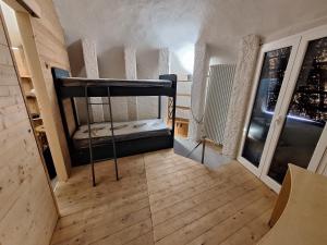 BardinetoにあるIl villaggio dei puffiの小さなお部屋で、二段ベッド1組が備わります。
