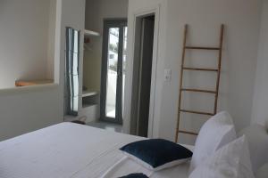 Postel nebo postele na pokoji v ubytování Orkeli casa