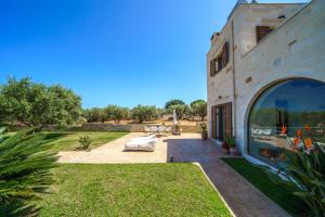 A garden outside FOS residence - ΦΩΣ ,luxury villa