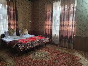 Кровать или кровати в номере Hotel Wazir Palace