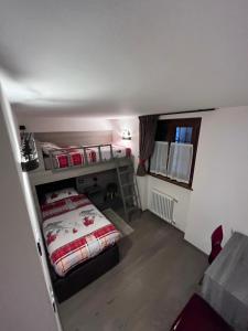 A bed or beds in a room at Dolomites Holiday Home