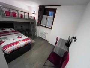 A bed or beds in a room at Dolomites Holiday Home