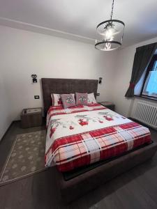 A bed or beds in a room at Dolomites Holiday Home