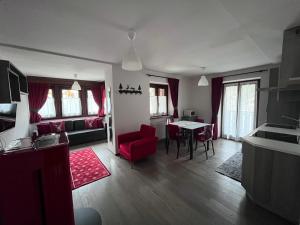 A kitchen or kitchenette at Dolomites Holiday Home