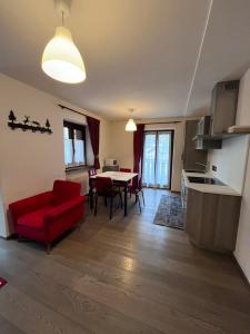 A kitchen or kitchenette at Dolomites Holiday Home