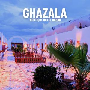 a view of a building with a hotel in chazla boutique hotel dances at Ghazala Boutique Hotel Dahab in Dahab