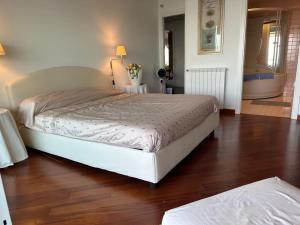 Posteľ alebo postele v izbe v ubytovaní Sana Luxury Apartment