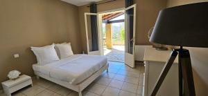 Posteľ alebo postele v izbe v ubytovaní Rez-de-villa T4, idyllique et indépendant