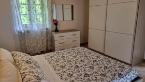 Postel nebo postele na pokoji v ubytování Agriturismo Pastorelli