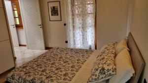Postel nebo postele na pokoji v ubytování Agriturismo Pastorelli