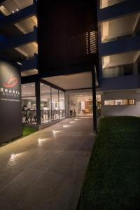 an external view of a building at night at Brasil Suites Boutique Hotel in Athens