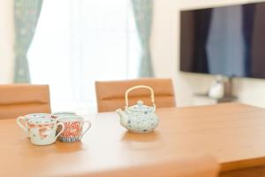 TV a/nebo společenská místnost v ubytování Tokyo Kitaku hotel