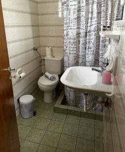 Koupelna v ubytování KIRIKOS ROOMS