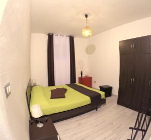 Posteľ alebo postele v izbe v ubytovaní Appartamento in villa