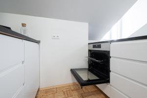 Kuchyňa alebo kuchynka v ubytovaní 2 Zimmer Wohnung in der Stadt - Grazy Appartment