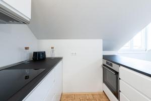 Kuchyňa alebo kuchynka v ubytovaní 2 Zimmer Wohnung in der Stadt - Grazy Appartment