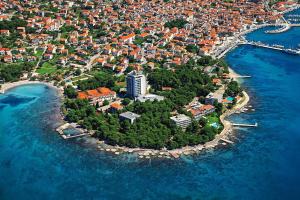 an aerial view of an island in the water at Apartments and Rooms Bozena in Vodice