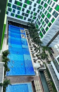 an overhead view of a building with a large swimming pool at Republic Airport Apartment Free Swimming Pool in Ho Chi Minh City +6 photos
