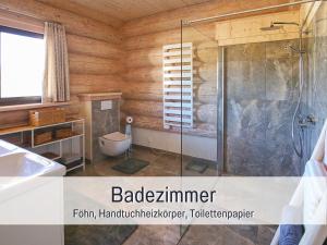 Kylpyhuone majoituspaikassa Natur-Chalet zum Nationalpark Marie-Luise inkl E-Auto