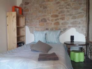 Postel nebo postele na pokoji v ubytování Chambre double