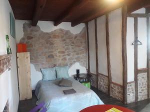 Postel nebo postele na pokoji v ubytování Chambre double