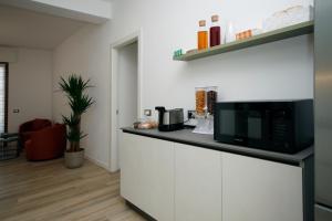 Kuchyň nebo kuchyňský kout v ubytování B&B Boccaleone