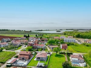 an aerial view of a residential estate with a river at Villa Tea in Umag