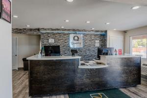 a lobby of a dental office with a stone wall at Quality Inn Rockport on Aransas Bay in Rockport