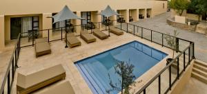 an overhead view of a swimming pool in a building at Clanwilliam Hotel in Clanwilliam