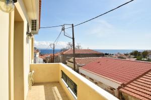 a view from the balcony of a building at Kentos Airy & Fully Equipped 3BR Family Maisonette in Chios